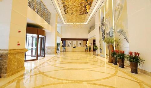 Lobby o reception area sa Xingtai Yuehai Hotel