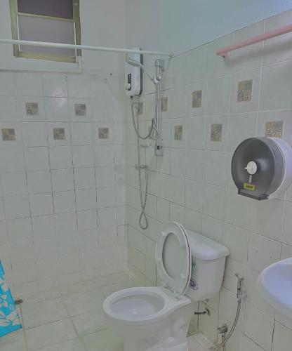 a bathroom with a toilet and a shower in it at Cozy Home With Lake View at Kathu PHUKET 3 BR in Ban Huai Luk (1)