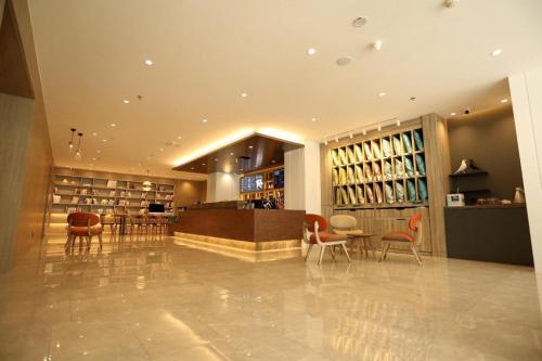 Xing'an şehrindeki Hanting Premium Hotel Yanji West Market tesisine ait fotoğraf galerisinden bir görsel