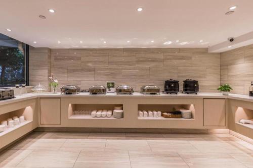 Majoituspaikan Hanting Premium Hotel Xiamen SM Plaza Songbo keittiö tai keittotila
