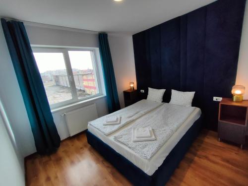 Postel nebo postele na pokoji v ubytování Fanea Residence