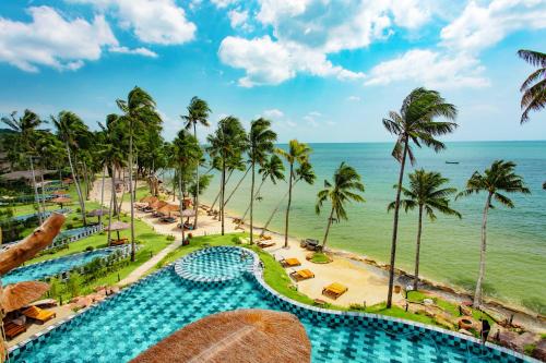 an aerial view of the beach and the pool at the resort at GRAND OCEAN BAY RESORT PHU QUOC in Phu Quoc