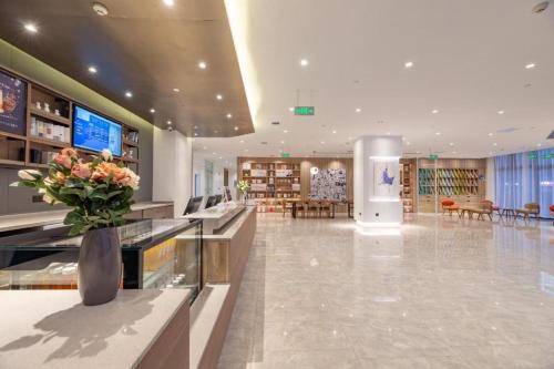 Vestibiulis arba registratūra apgyvendinimo įstaigoje Hanting Premium Hotel Ji'nan Tangzhi