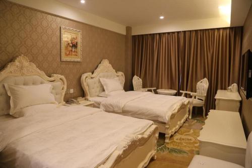 Starway Hotel Lianyungang Suning Plazaにあるベッド
