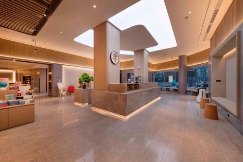El vestíbulo o zona de recepción de Ji Hotel Shanghai Fengzhuang Qilianshan Nan Road
