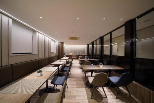 Restavracija oz. druge možnosti za prehrano v nastanitvi Hanting Hotel Shanghai Wujiaochang Shiguang Road