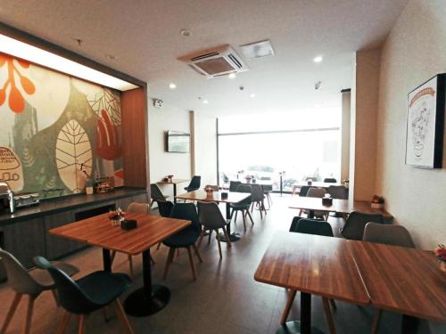 En restaurang eller annat matställe på Hanting Hotel Zibo Railway Station