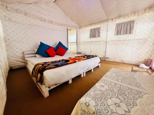 Voodi või voodid majutusasutuse SnowDrop eco resort toas
