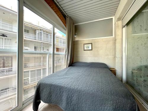 A bed or beds in a room at COSTA DAURADA APARTAMENTS CENTER