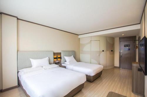 Легло или легла в стая в Hanting Hotel Pinghu Zhapu