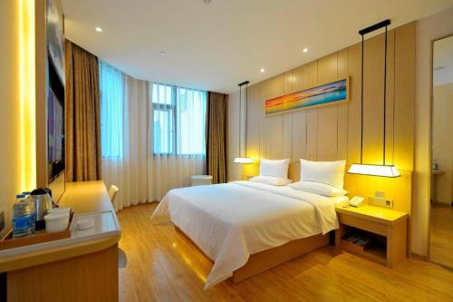 Cama o camas de una habitación en Starway Hotel Guiyang Big Cross