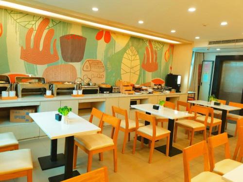 En restaurant eller et andet spisested på Hanting Hotel Mianyang Municipal Government