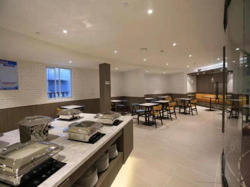 Restoranas ar kita vieta pavalgyti apgyvendinimo įstaigoje Hanting Premium Hotel Donghai County Government