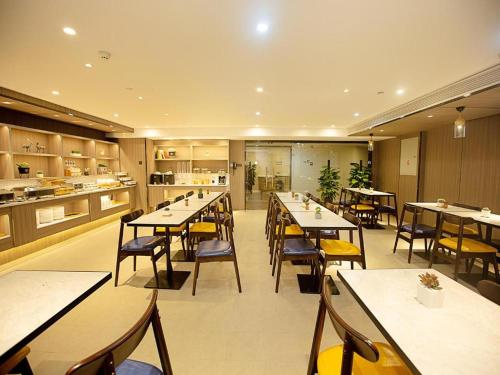 Restaurant ou autre lieu de restauration dans l'établissement Hanting Premium Hotel Luoyang University City