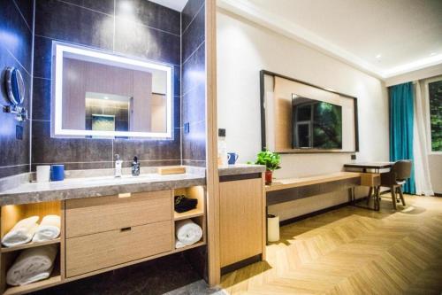 Ванная комната в Starway Hotel Linqi Renmin Square