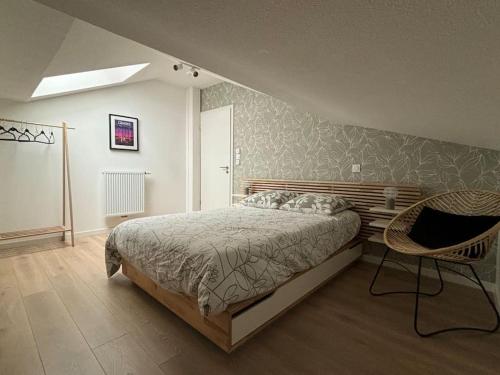 Postel nebo postele na pokoji v ubytování Spacieux appartement neuf au cœur de Bisca plage