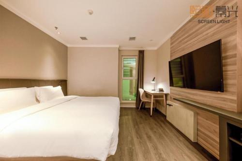 Bilde i galleriet til Hanting Premium Hotel Delingha Jinghuawan Plaza i Delingha