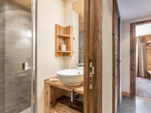 a bathroom with a sink and a shower at Appartement La Clusaz, 2 pièces, 5 personnes - FR-1-304-149 in La Clusaz