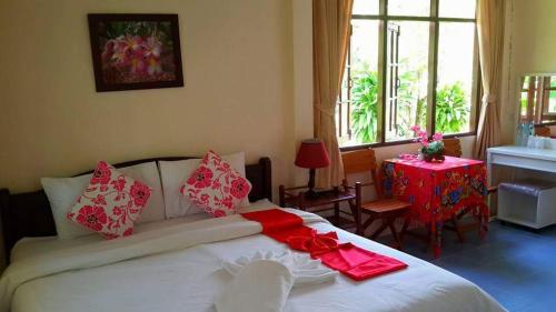 Uma cama ou camas num quarto em Krabi Discovery Resort