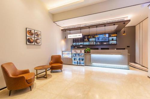 Lobbyn eller receptionsområdet på Hanting Hotel Jinan Beiyuan Street Ouyada