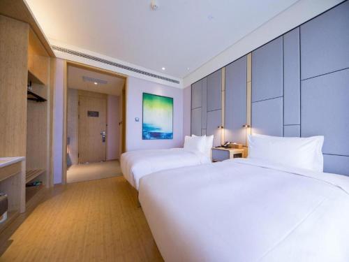 Krevet ili kreveti u jedinici u okviru objekta Starway Hotel Jining Taibai Middle Road Yunhecheng