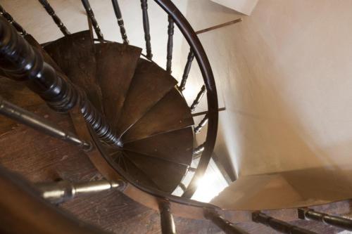 a spiral staircase in a building at Castello di Lispida in Monselice
