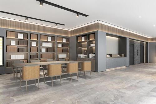 a rendering of a room with a table and chairs at Ji Hotel Hangzhou West Lake Hubin Road Pedestrian Street in Hangzhou
