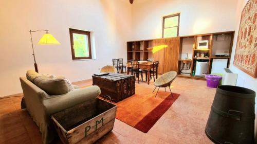 a living room with a couch and a table at Castello di Lispida in Monselice
