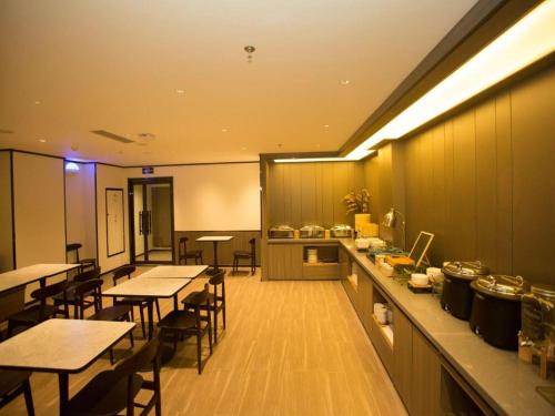 Restaurant ou autre lieu de restauration dans l'établissement Hanting Hotel Jining Tangkou Airport