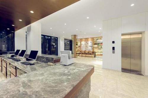 Nuotrauka iš apgyvendinimo įstaigos Hanting Premium Hotel Xi'ning Bayi Road Minhang Tower mieste Sininas galerijos