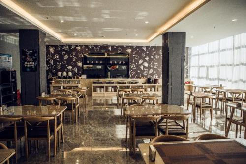 Restoran ili neka druga zalogajnica u objektu Hanting Premium Hotel Ordos Kangbashi Scenic