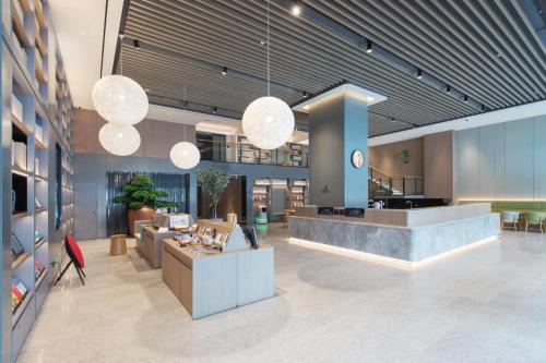 Lobbyen eller receptionen på Ji Hotel Ulanhot Wanda Plaza
