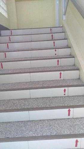 a set of stairs with red numbers on them at Asia Novo Boutique Hotel-Cabuyao in Bigaa
