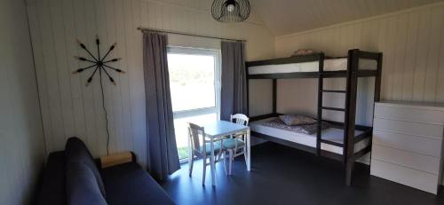 Postel nebo postele na pokoji v ubytování Campsite Ģirti