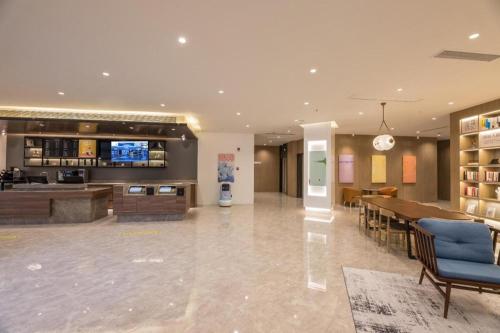 Hanting Hotel Yangzhou Wuyue Plaza tesisinde lobi veya resepsiyon alanı