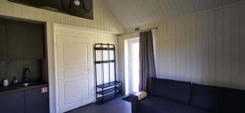 Posezení v ubytování Campsite Ģirti