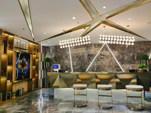 Starway Hotel Urumqi Exhibition Center tesisinde lobi veya resepsiyon alanı