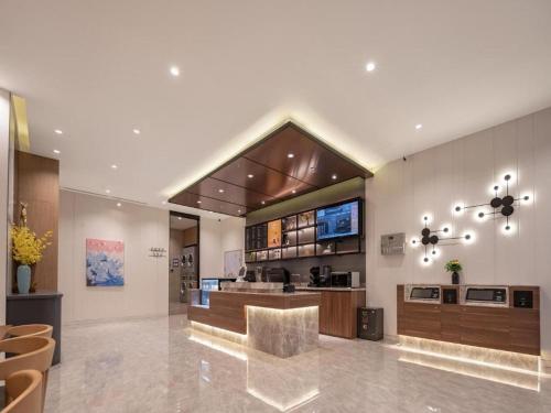 Zona de hol sau recepție la Hanting Hotel Jinan West Station Zhanqian Square