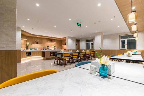 Restavracija oz. druge možnosti za prehrano v nastanitvi Hanting Premium Hotel Tianjin Nankai University