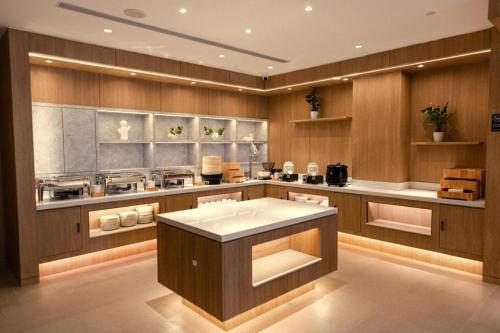 A cozinha ou cozinha compacta de Hanting Hotel Beijing Headquarters Base World Park South Branch