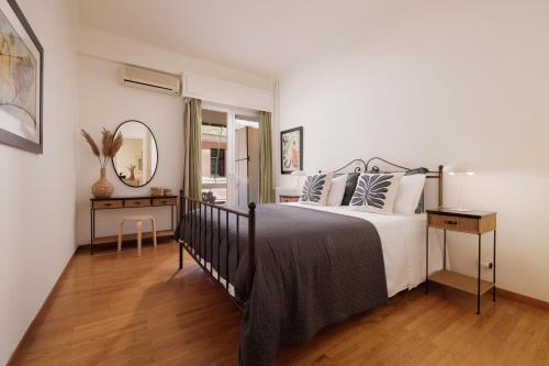 Postel nebo postele na pokoji v ubytování Zampeli Apartment