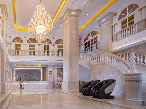 Lobby alebo recepcia v ubytovaní Vienna Hotel Hunan Huaihua Xupu Wanda Plaza