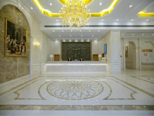 Lobby o reception area sa Vienna Hotel Ganzhou Economic Development Zone 1st Hospital West High-Speed Railway Station