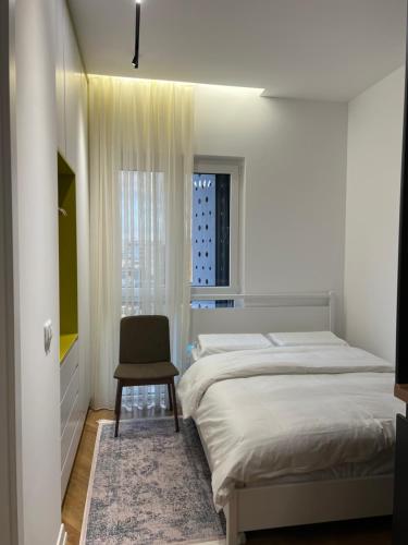 En eller flere senge i et værelse på Sun Cane Apartment