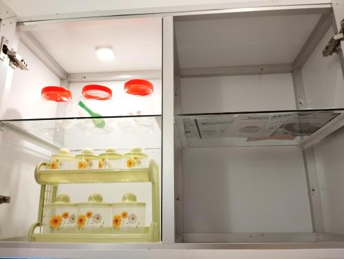 a refrigerator with some food inside of it at Serene Bliss Villa in Unawatuna