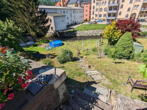 an aerial view of a park in a city at HW4B - Urlaubsmagie - Zentral mit Gemeinschaftsgarten, -Pool, -Sauna & Whirlpool in Sebnitz