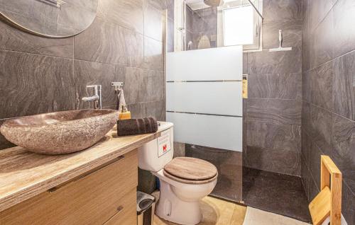 a bathroom with a sink and a toilet and a shower at Urb, La Siesta in Torrevieja
