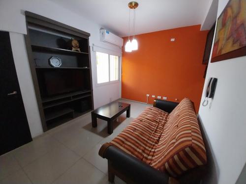 Ένα ή περισσότερα κρεβάτια σε δωμάτιο στο Duplex Yrigoyen A