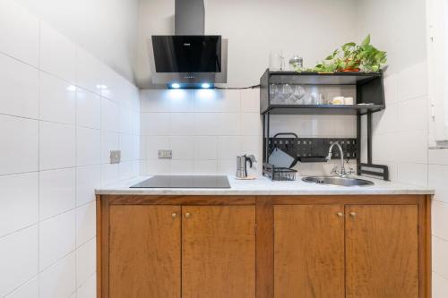 a kitchen with a sink and a counter top at Panzani 13 in Florence