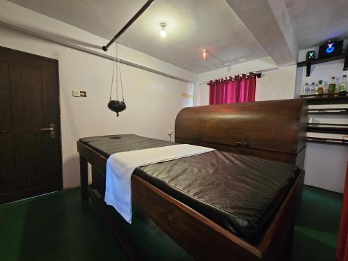 Postel nebo postele na pokoji v ubytování Grand Villa Kalametiya